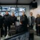 alt="Rogelio Frigerio y Francisco Azcué en la inauguración del centro de monitoreo en Concordia junto a efectivos de la policía provincial"