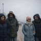alt="imagen ilustrativa de la costanera de Concordia con gente muy abrigada durante la alerta amarilla por bajas temperaturas en Entre Ríos"
