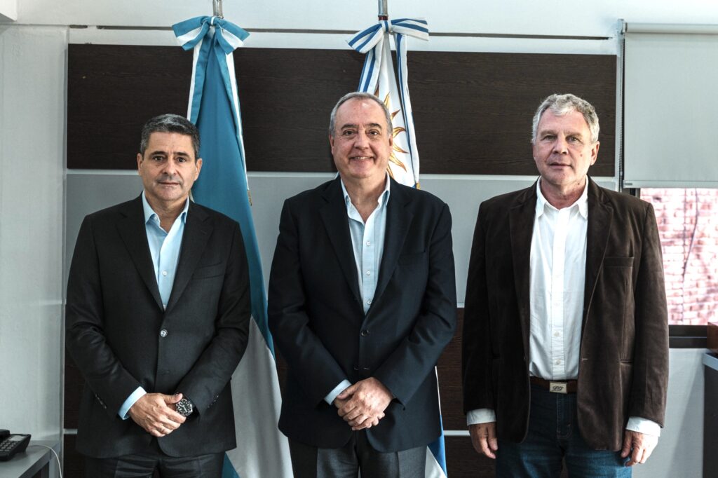 alt="Integrantes de la Delegación Argentina ante la CTM de Salto Grande: Marcone, Daneri y Galimberti"